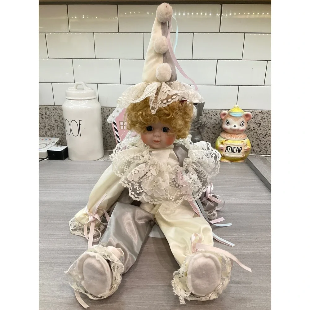 VINTAGE PORCELAIN DOLL IN CLOWN COSTUME